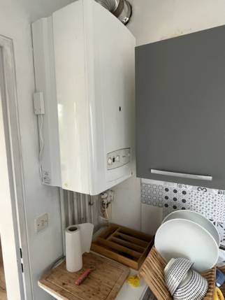 Chaudière apparente dans la cuisine avant rénovation - Nantes 44