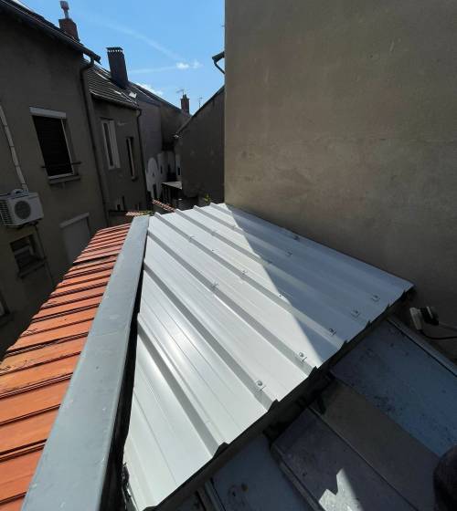 Rénovation de l'isolation d'une toiture plate (03200)