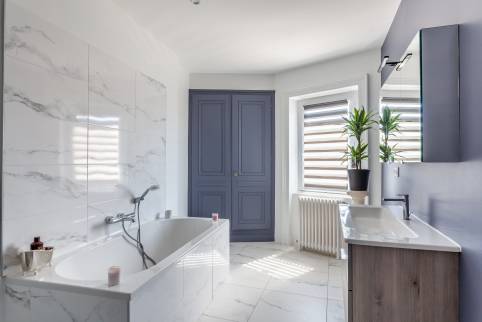 Rénovation d'une maison de famille avec construction d'un garage double