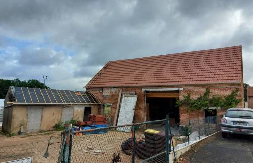 Bouchement dans mur de façade