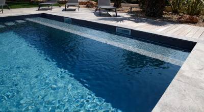 Couverture de piscine immergée et motorisée