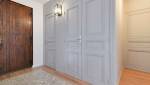Rénovation complète d'une maison Ouest Lyonnais - entrée avec tapis carrelé
