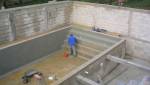 Construction des fondations de l'extension avec piscine intérieure