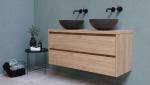 Un meuble avec double vasque dans une salle de bain zen 