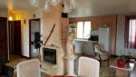 Rénovation complète d'une maison Ouest Lyonnais : vue séjour cuisine avant travaux