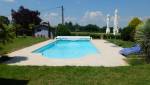 Réalisation d'une terrasse et d'une plage de piscine, maison à Dommartin