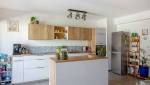 Rénovation d'un appartement avec cuisine ouverte sur l'espace séjour, Lyon 