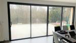 Grande baie vitrée dans le salon (Yerres 91330)