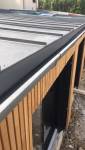 Extension ossature bois avec son bardage en Douglas et sa couverture en zinc quartz à joint debout - Nantes 44
