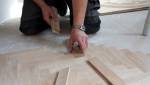 Pose d'un parquet dans le secteur de Joue Les Tourres