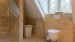 Espace douche en travertin