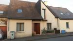 Ravalement de façade d’une maison en pierre au Coudray Montceaux
