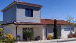 Surélévation sur le côté d'une maison
