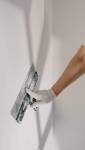 Application d'un tadelakt blanc sur les murs