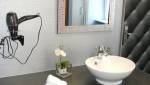Aménagement de salles de bain fonctionnelles pour les clients d'un hôtel à Lille