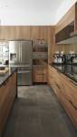 Cuisine avec îlot central et mobilier en bois - Hyères 83