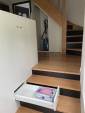 Rangements mi-hauteur du grand meuble dans l'escalier (Essonne 91)