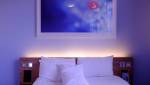 Chambre à coucher éclairage tête de lit