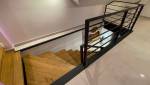 Escalier pour accéder à la surélévation à Deauville
