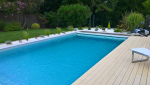 Construction d’une piscine avec belle terrasse en bois