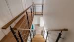 L'escalier vu de l'étage à Lachapelle Aux Pots