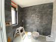 Pose d'un carrelage sur la totalité de la salle de bain La Maison des Travaux Vannes Sarzeau Pénestin