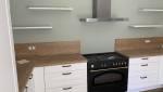 Après travaux : vert d'eau au mur pour magnifier la cuisine - Rennes