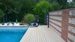 Construction piscine enterrée avec terrasse bois composite et clôture assortie - Meaux - 77100 - 