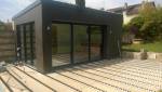 Extension en parpaign à toit plat avec pool piscine sur terrasse bois composité - Meaux - 77100 -