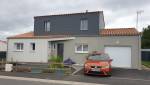 Surélévation finie avec son bardage gris