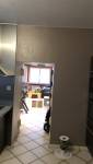 mur de séparation avant travaux (vue de la cuisine)