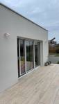 Création d'une terrasse sur plots en carrelage imitation bois