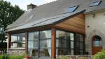 Extension de maison avec toiture en pente ardoise