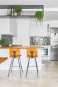 Cuisine blanche et verte : réagencement et rénovation dans un appartement lyonnais, quartier Tête d’Or