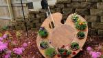 Jardin - succulentes dans poteries sur roue -  