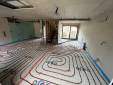 Installation d’un plancher chauffant dans une maison située à Motte Servolex