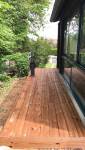Terrasse bois exotique devant véranda