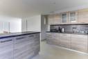 Rénovation complète d’une maison avec aménagement d’un garage transformé en séjour cuisine à Neuville sur Saône