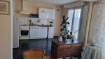 Espace de vie avec vue sur cuisine