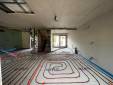 Installation d’un plancher chauffant dans une maison située à Motte Servolex