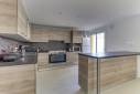 Rénovation complète d’une maison avec aménagement d’un garage transformé en séjour cuisine à Neuville sur Saône