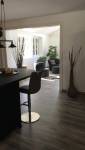 Vue intérieur côté cuisine avec poêle à bois - Travaux terminés