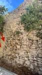 Mur avant enlèvement des pierres
