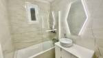 Rénovation salle de bain haut de gamme-beige et or