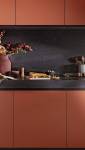 Cuisine Terracota avec crédence foncée