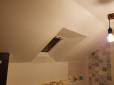 Pose d'un nouveau VELUX finition polyuréthane isolation et pose de placo-plâtre sur le rampant et pied droit