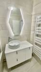 Rénovation salle de bain haut de gamme - beige et or