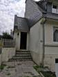 Avant travaux vielle peinture écaillée et sale sur les façades de la maison