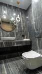 Salle de bain en marbre noir et blanc - Paris