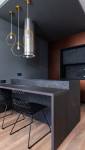 Ilot central et hotte suspendue pour cette superbe cuisine - Paris